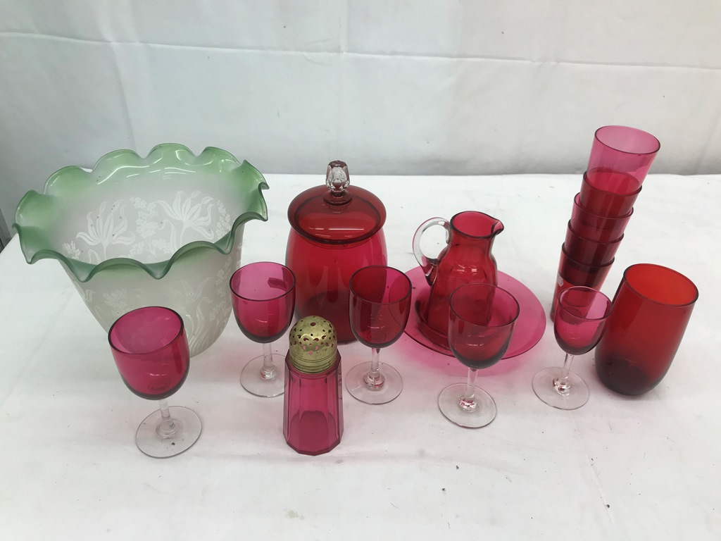 A quantity of cranberry glass,