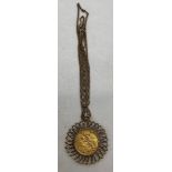 An 1891 Melbourne Mint sovereign in pendant on a 9ct chain