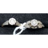 Two 18ct diamond solitaires