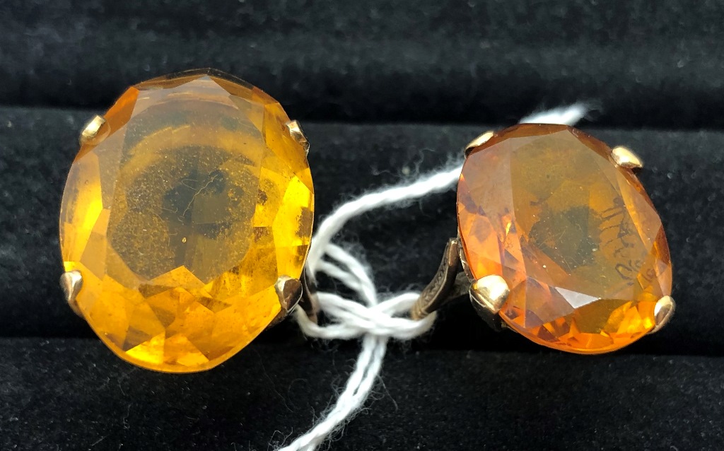 Two 9ct synthetic topaz rings,