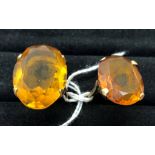 Two 9ct synthetic topaz rings,