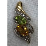 A 9ct peridot and citrine pendant