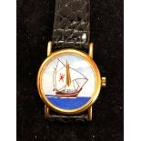 A Kutchinsky gold ladies watch with enamelled ship dial