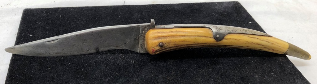 A 19th century carved antler lock knife