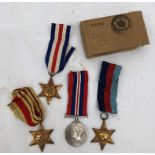 A box containing WWII medals