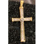 An 18ct diamond crucifix