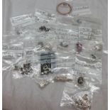 17 silver pendants and other jewellery.