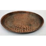 An Art Nouveau copper crocodile skin tray by JS & S