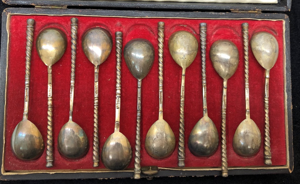 A cased set of 12 Russian silver teaspoons with twist handles,