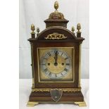 An eight-day movement bracket clock by Roskell & Co,