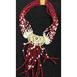 An ornate ruby necklace
