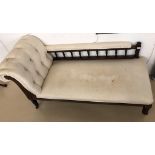 A mahogany upholstered chaise longue