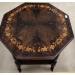 A walnut inlaid table with galleried base