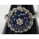 An 18ct diamond and sapphire dress ring