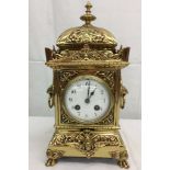 A 19th century French brass and copper cased eight-day mantel clock,