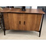 A mid 20th century sideboard by Maple, in the style of Gordon Russell,