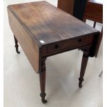 A 19th century mahogany drop-leaf table