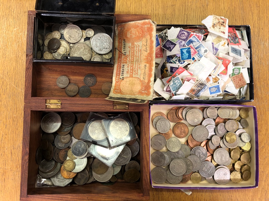 A quantity of coins and stamps