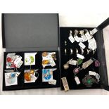 Two boxes of silver dress jewellery