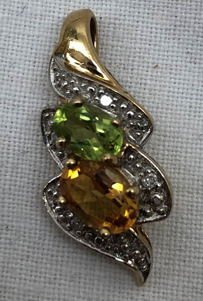 A 9ct peridot and citrine pendant