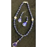 A lapis lazuli necklace;