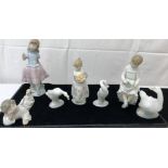 A quantity of Lladro & Nao figures