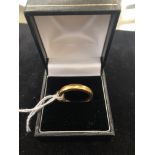 A 22ct gold ring