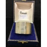 A boxed HM silver napkin ring from Harrods