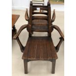 A pair of Arts & Crafts beech ladder back chairs