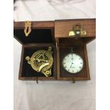 A boxed globe desk clock;