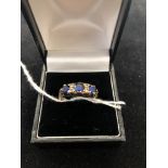 A 9ct blue stone dress ring