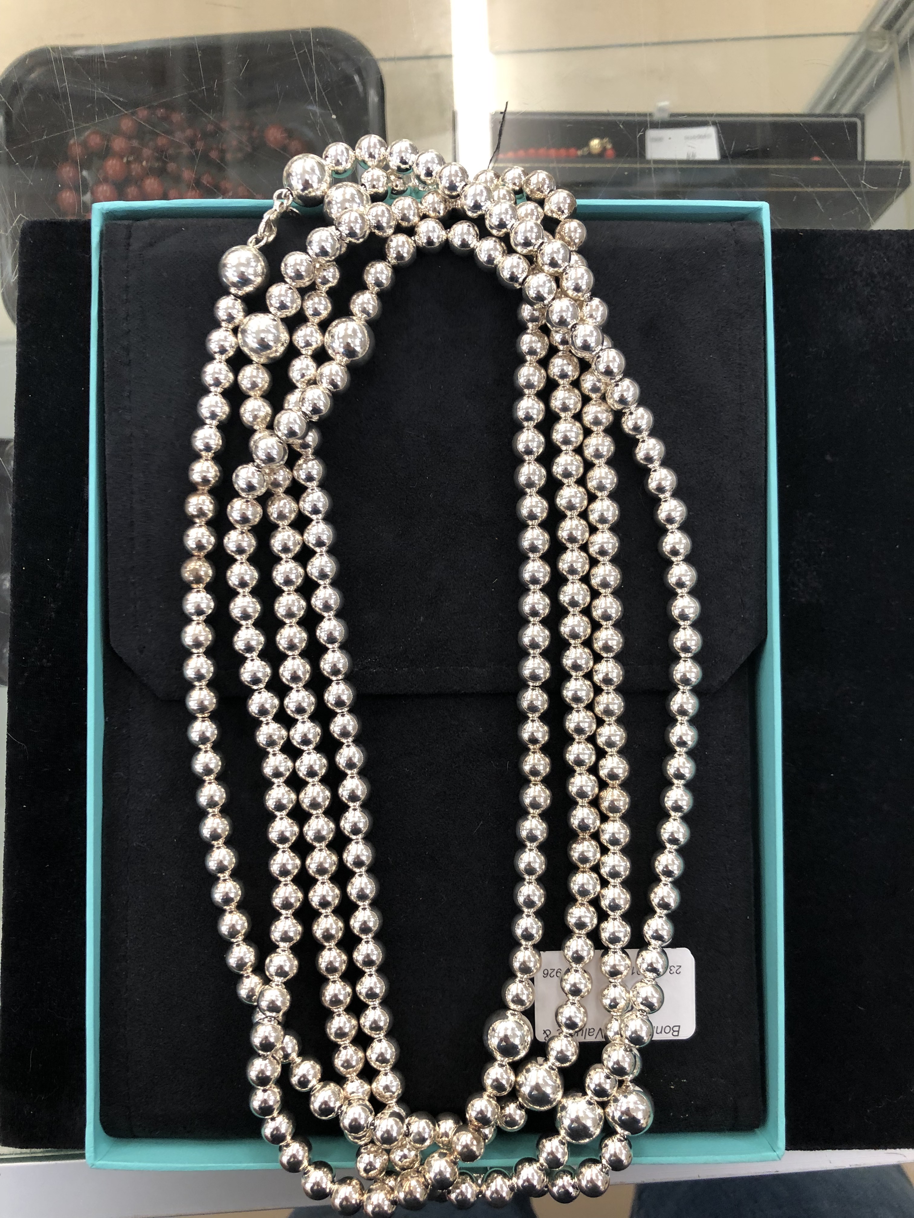 A long silver pearl flapper necklace by Tiffany