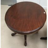 An early 20th century oval mahogany table
