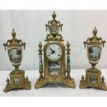 A Victorian-style brass clock garniture