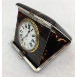 A HM silver and tortoiseshell travel clock by C & C,