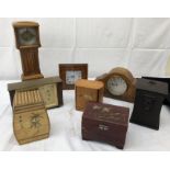 A quantity of wooden clocks; together with a Japanese lacquered music box,