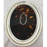 A HM silver and tortoiseshell oval tray by Charles and Richard Comyns,