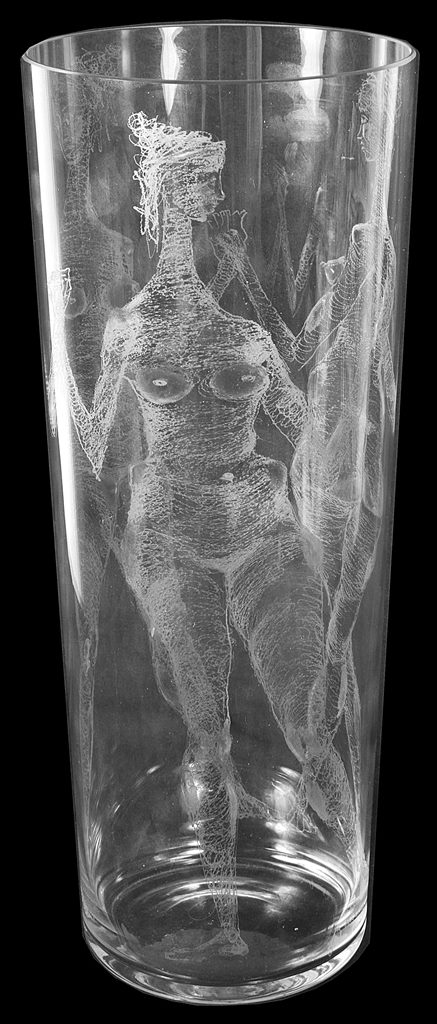 A Signed John Hutton Etched Glass Vase: Engraved with three naked women holding hands,