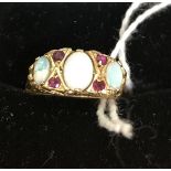 A 9ct opal and ruby dress ring