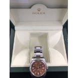 A Rolex Oyster Perpetual with bronze dial (in box)