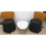 Two orange box chairs;