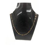 A 14k coloured sapphire necklace: pink, blue, green,