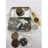 A quantity of coins and tokens;