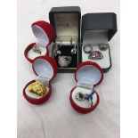 Five boxed dress rings to inc silver examples