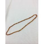 An amber graduated necklace