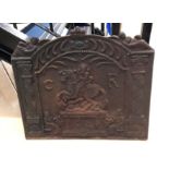 A cast-iron fireback dated 1644