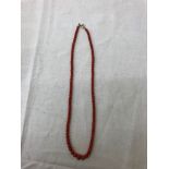 A red coral necklace