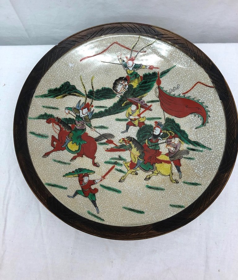 A 19th century Chinese charger depicting warriors