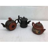 Three Chinese teapots