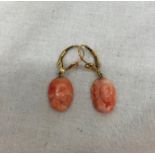 Gold and coral earrings